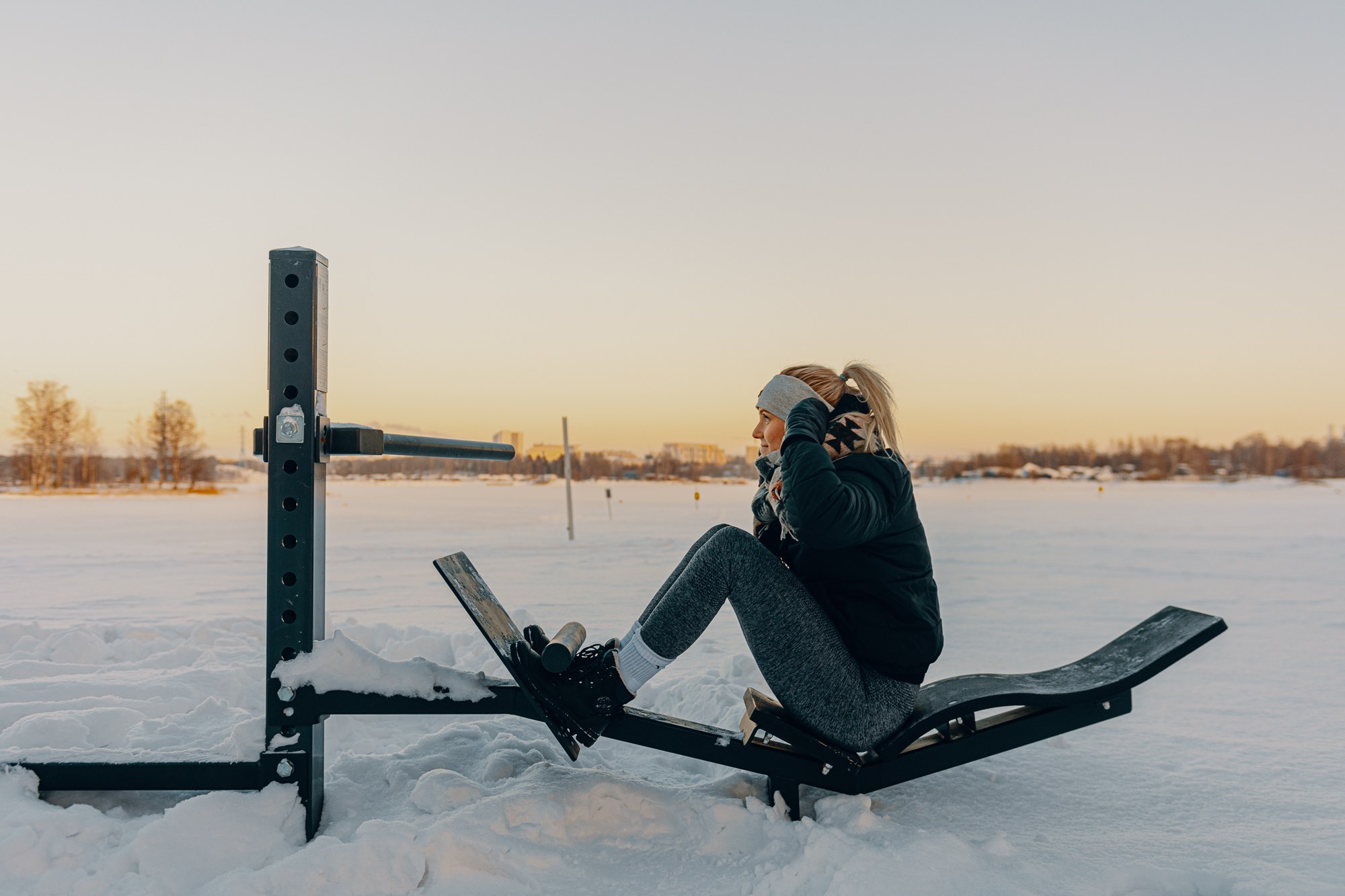 Woman working out outdoors in winter