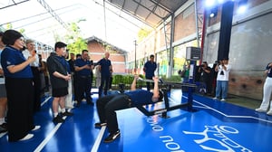 Omnigym outdoor bench press demonstrated by a man at the Benchakitti Park for Better Health opening ceremony in Benchakitti Park.
