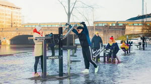 People working out at outdoor gym in winter